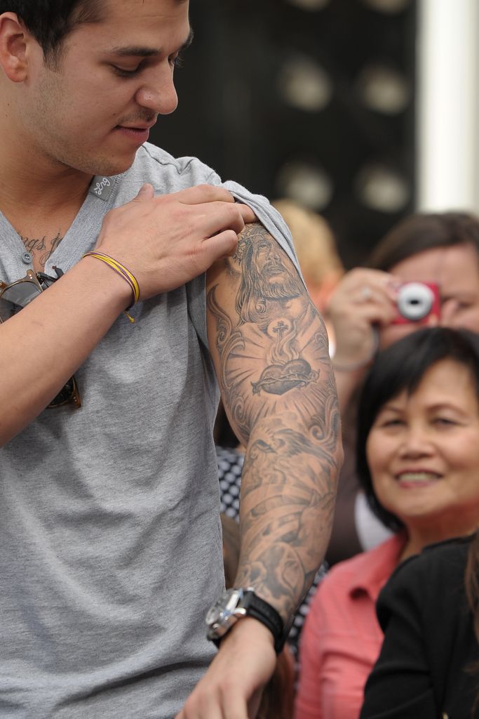 Rob Kardashian showing his full tattoo sleeve