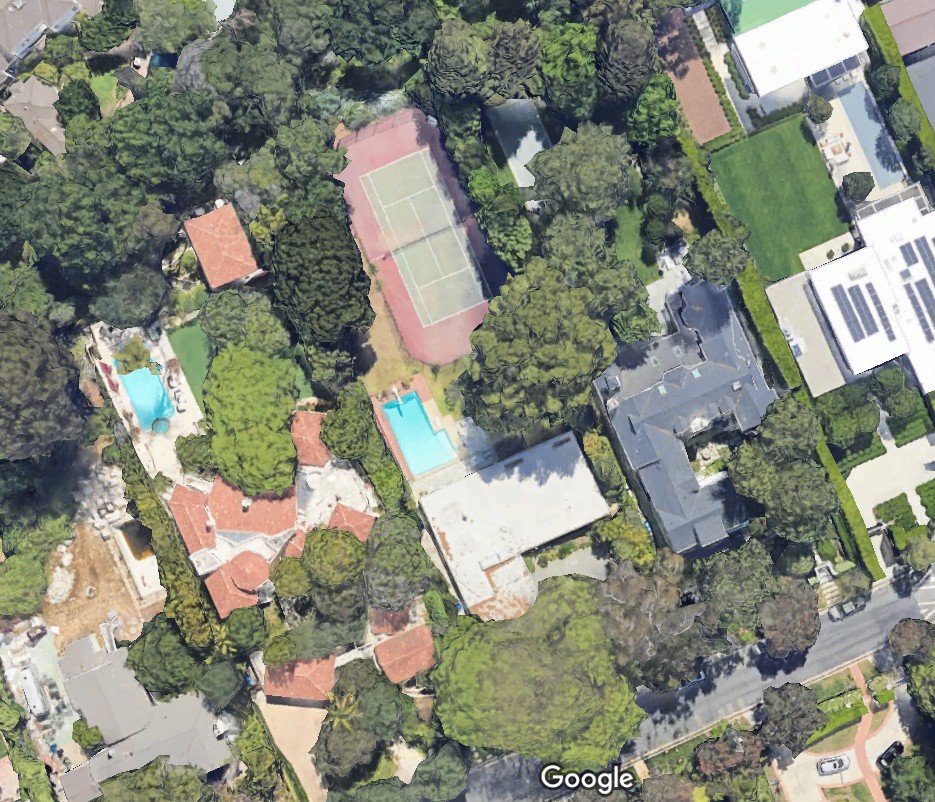 Aerial shot from Google Maps shows the property before demolition, which looked like it had a tennis court on grounds, as well as a pool.