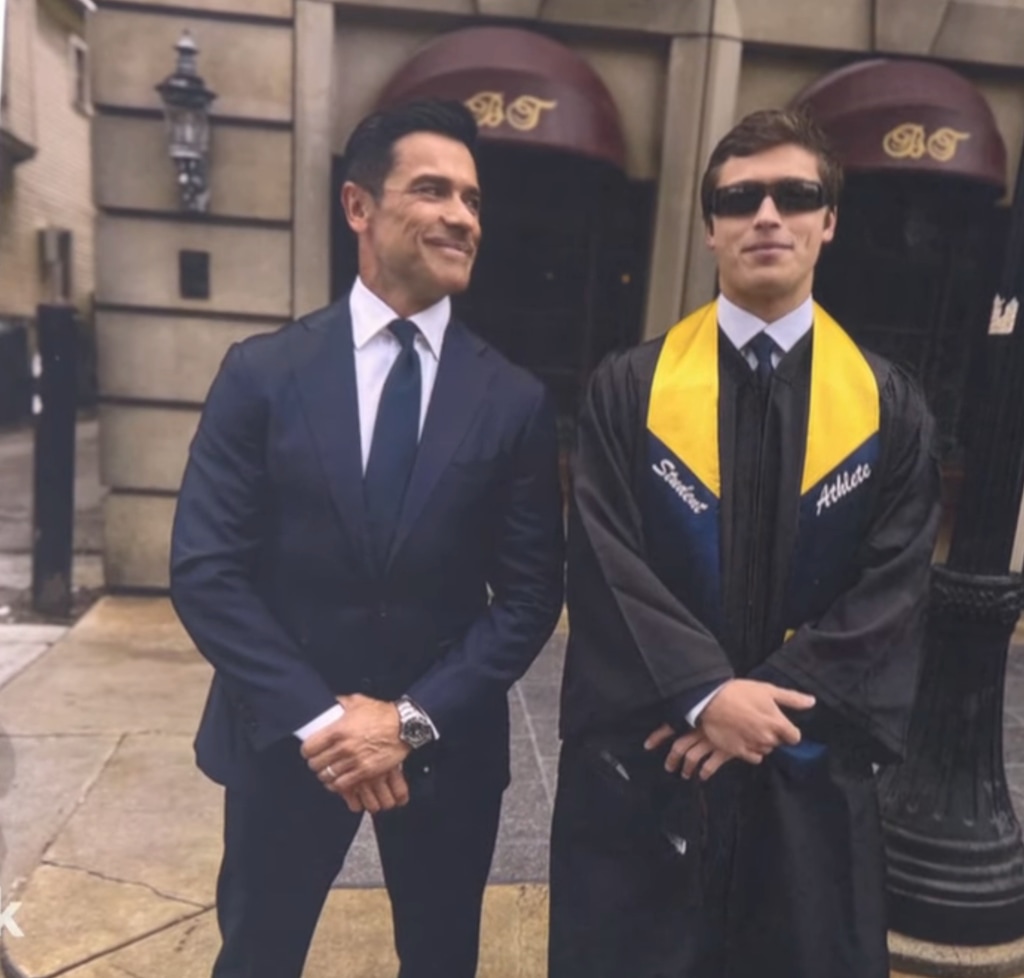 Mark Consuelos poses beside his son Joaquin Consuelos at the latter's graduation ceremony at the University of Michigan, shared on LIVE with Kelly and Mark