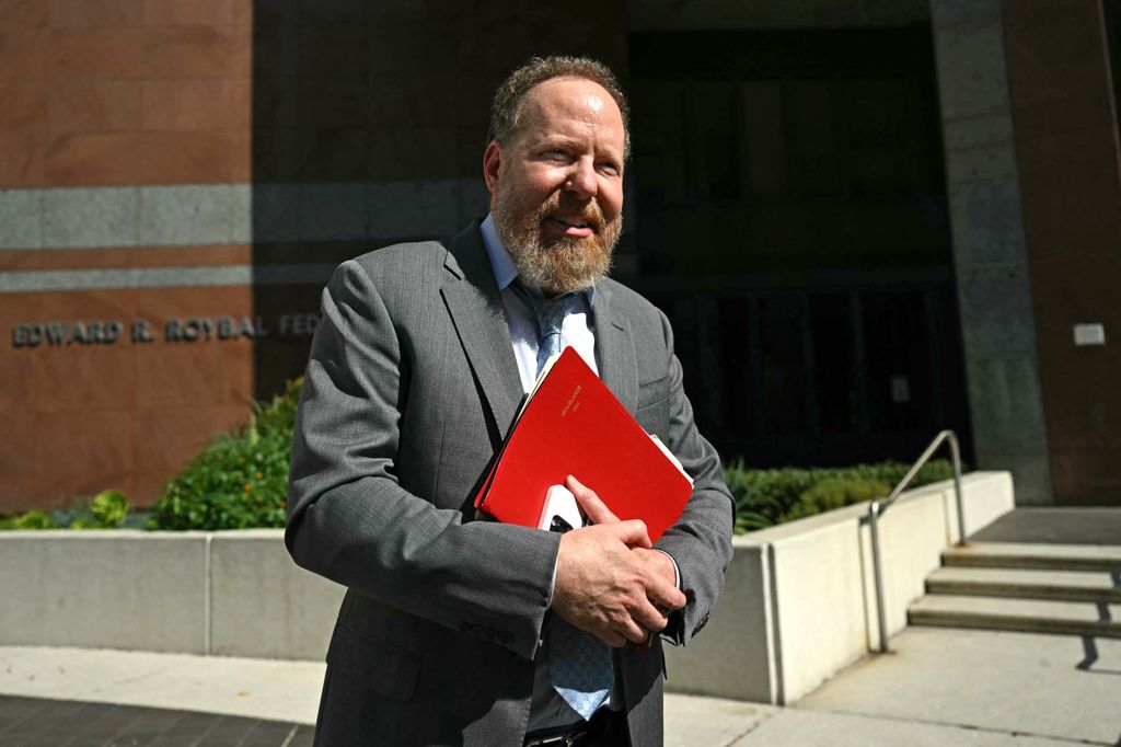 Salvador Plasencia's attorney Stefan Eric Sacks speaks with the press following a press conference 