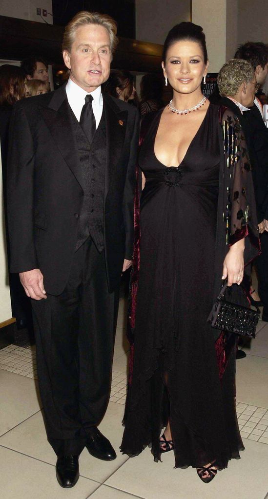 American actor Michael Douglas and British actress Catherine Zeta-Jones arrive at the "Orange British Academy Film Awards 2003" held at the Odeon Cinema Leicester Square on March 13, 2003 in London.