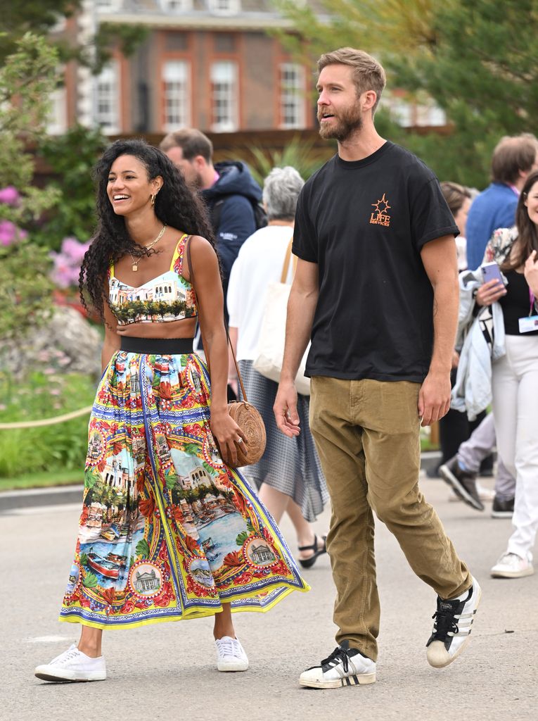 Vick Hope and Calvin Harris walking outside