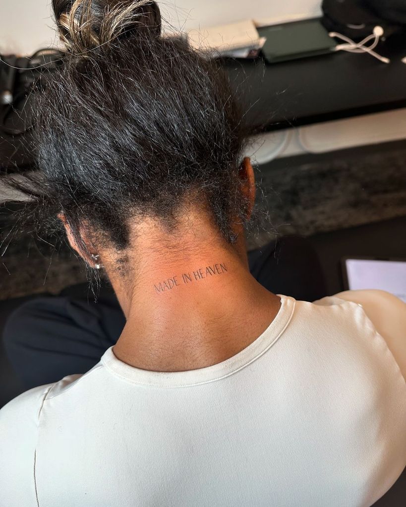 Simone Biles receives the phrase "Made in Heaven" tattooed on her neck, shared on Instagram