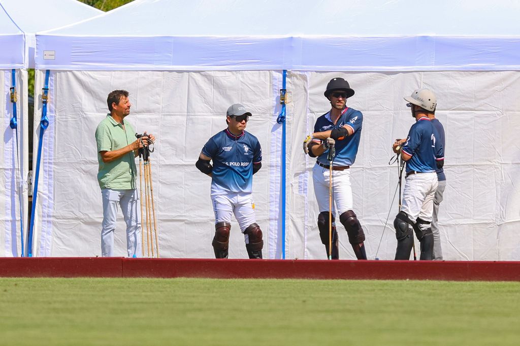 Prince William dressed in polo gear and helmet