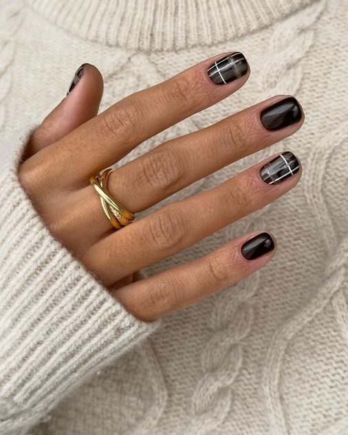 monaj dark tartan nails.