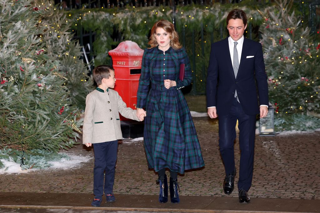 The eldest York daughter rounded off her Christmassy ensemble with midnight blue suede boots
