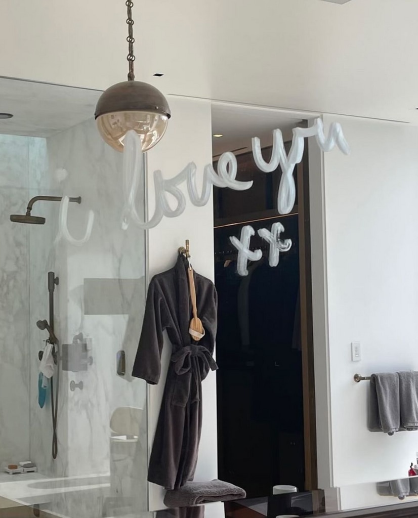 Photo shared by Jennifer Aniston on Instagram April 2024 of her bathroom, and "I love you xx" is written in the mirror.