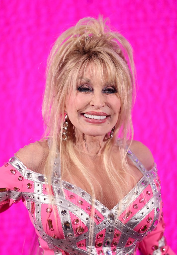 dolly parton smiling pink outfit rockstar