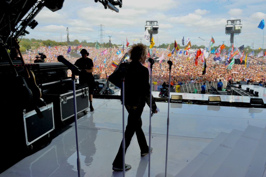 Rod Stewart walks onto the Pyramid stage at Glastonbury