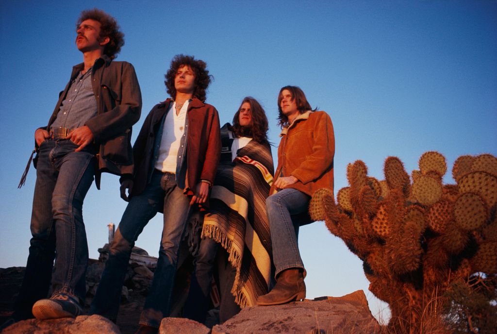 The rock band The Eagles rest in a desert valley