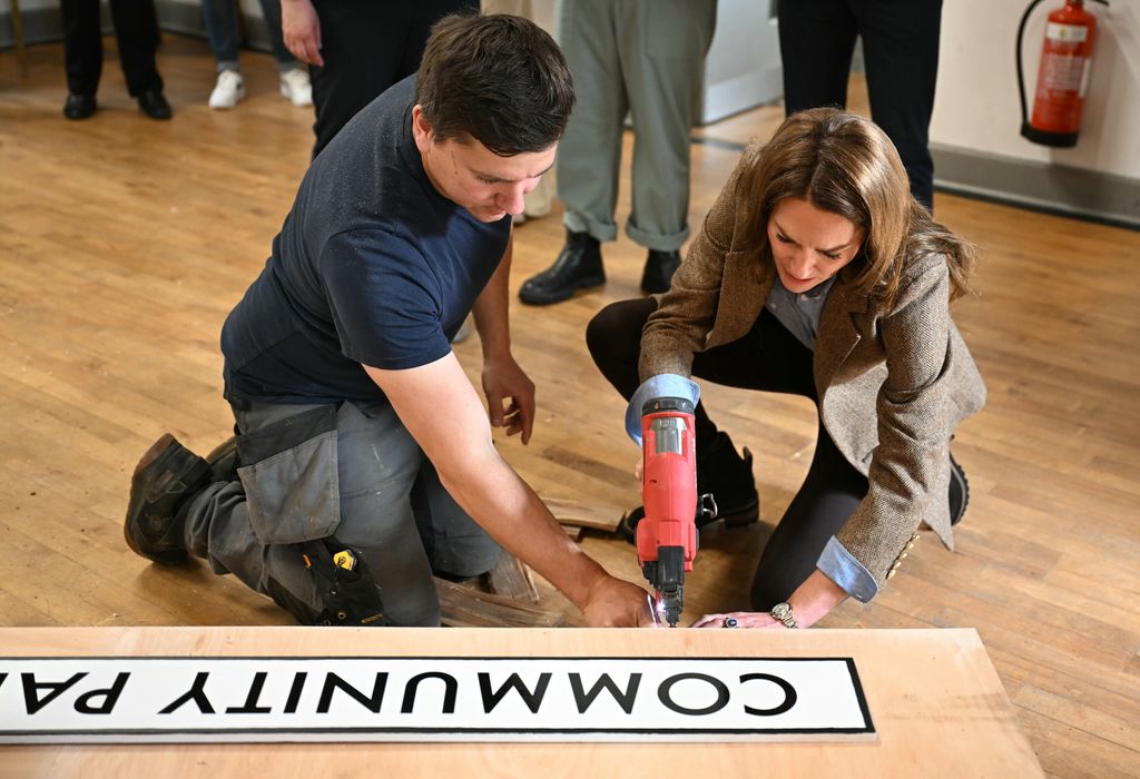 Kate Middleton using a nail gun