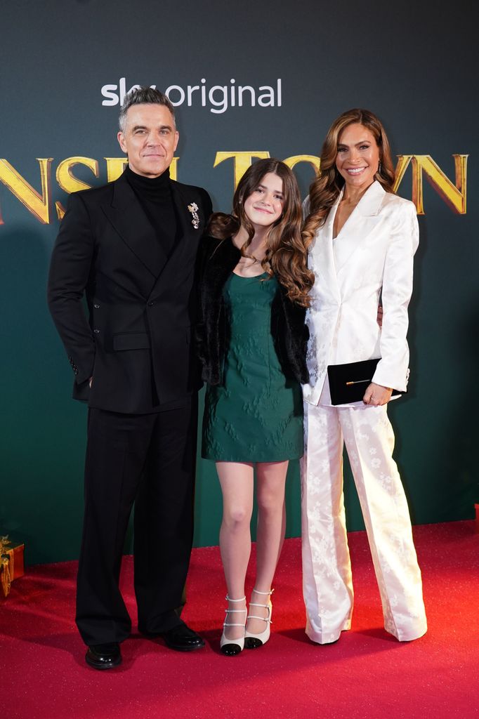 Robbie Williams, Teddy Williams and Ayda Field Williams arrive for the UK premiere of Tinsel Town, at Vue, Leicester Square in London. Picture date: Thursday November 27, 2025. (Photo by Ian West/PA Images via Getty Images)