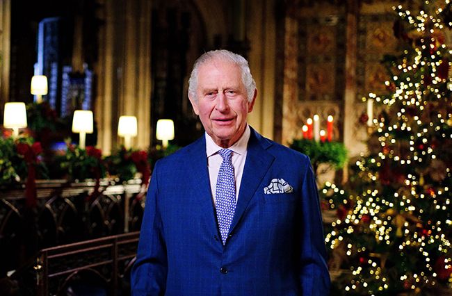 King Charles in a blue suit in church