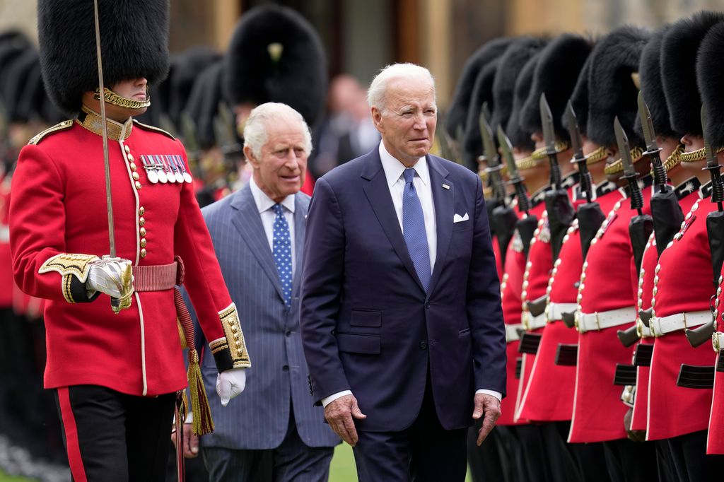 The King and President Joe Biden inspect a Guard of Honour