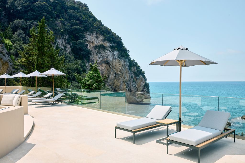exterior pool at luxe hotel overlooking ionian sea