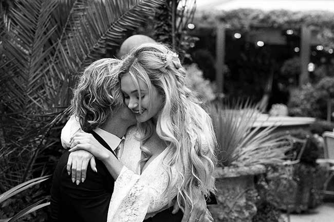 Anna Fowler wedding photo hugging