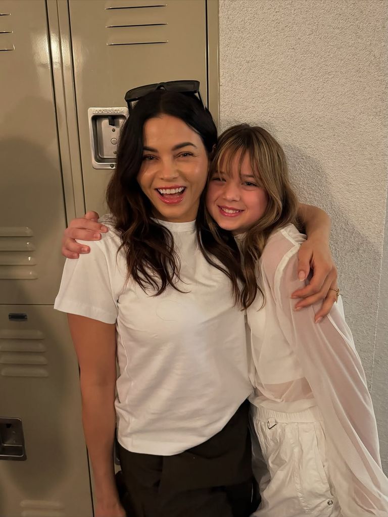Jenna Dewan and Everly pose next to high school lockers