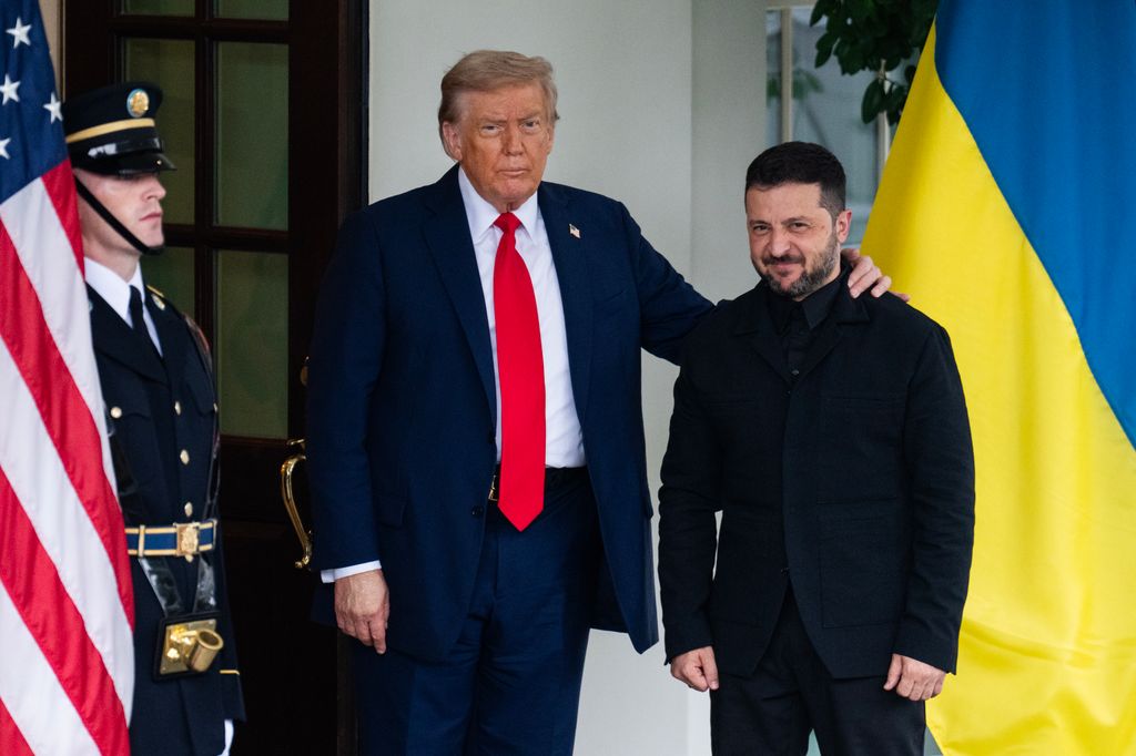 President Donald Trump greets Ukrainian President Volodymyr Zelenskyy at the White House before a meeting with European leaders to discuss ending the war with Russia on Monday, August 18, 2025