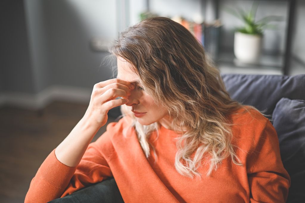 mature adult woman working at home