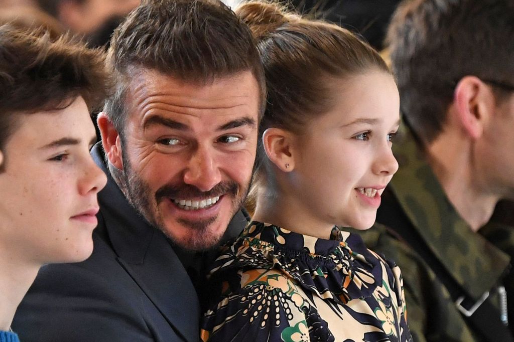 Harper Beckham with her dad David at London Fashion Week 2020