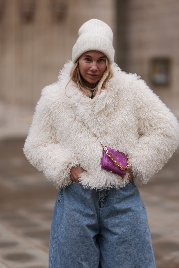 woman in fluffy white coat