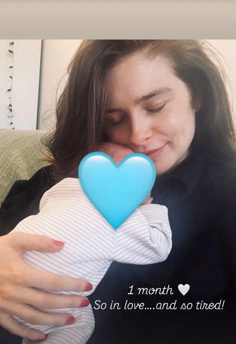 Mother holding newborn baby