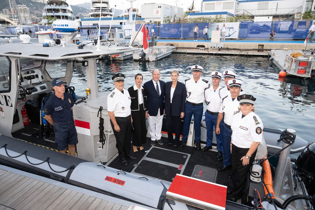 Charlotte Casiraghi stood with Prince Albert, Princess Charlene and six marine police officers