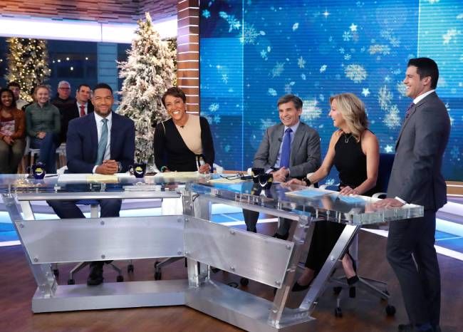 Good Morning America hosts Michael Strahan, Robin Roberts, George Stephanopoulos, Amy Robach, and Gio Benitez
