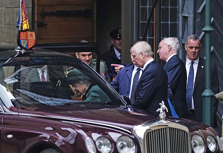 queen getting into car