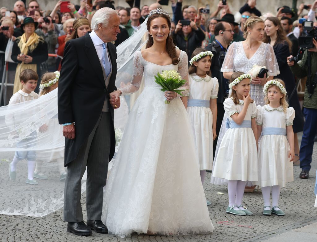 Sophie-Alexandra Evekink and her father Dorus Evekink pictured at the Theatinerkirche for the church wedding to Ludwig Prince of Bavaria.