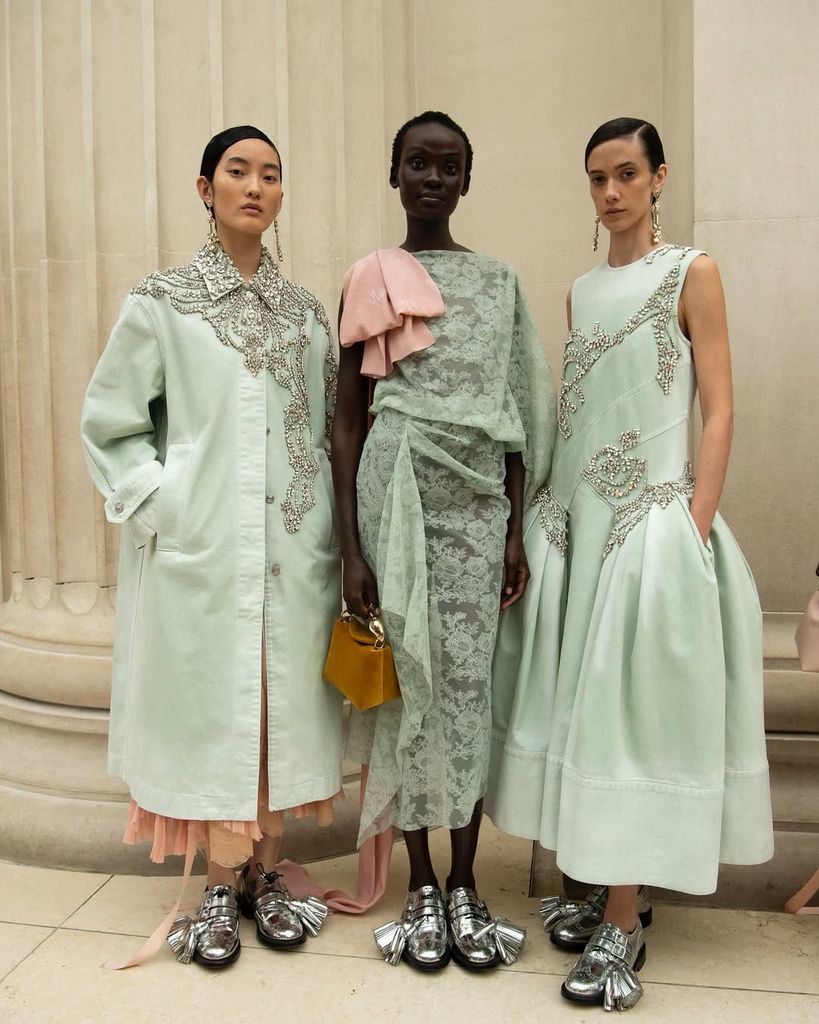 model in green dresses backstage at erdem