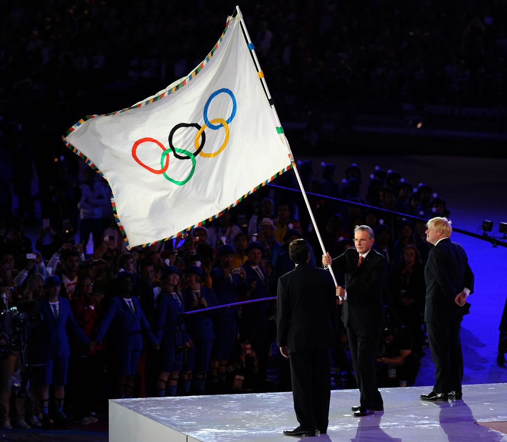 Jacques Rogge IOC president  hands over the Olympic flag to Rio de Janeiro Mayor Eduardo Paes during the Closing Ceremony of the London 2012 London Olympics