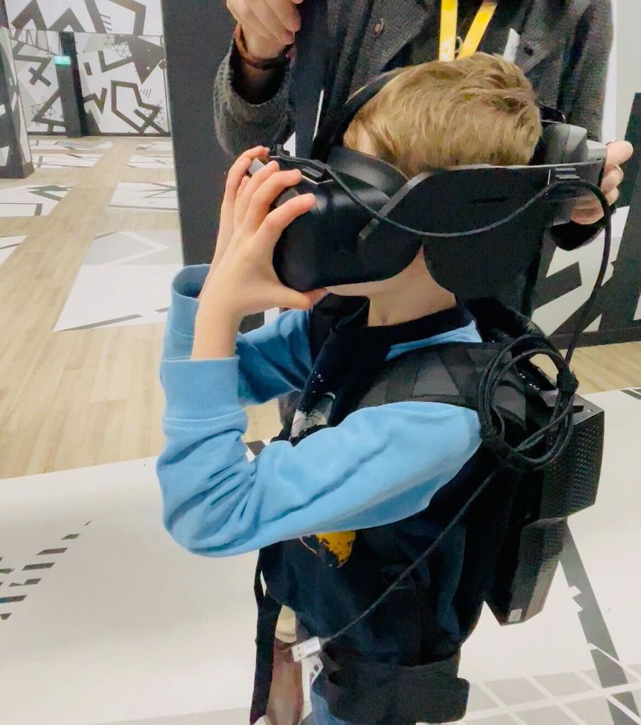 boy wearing a VR headset