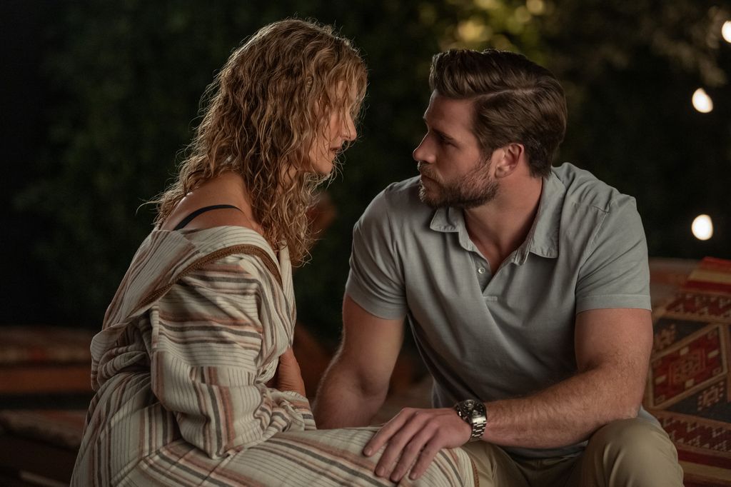 Laura Dern as Katherine Loewe and Liam Hemsworth as Owen Brophy in Lonely Planet