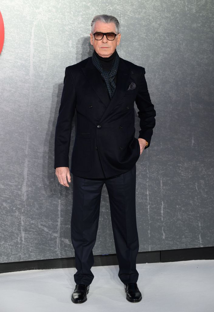 pierce brosnan in suit and glasses