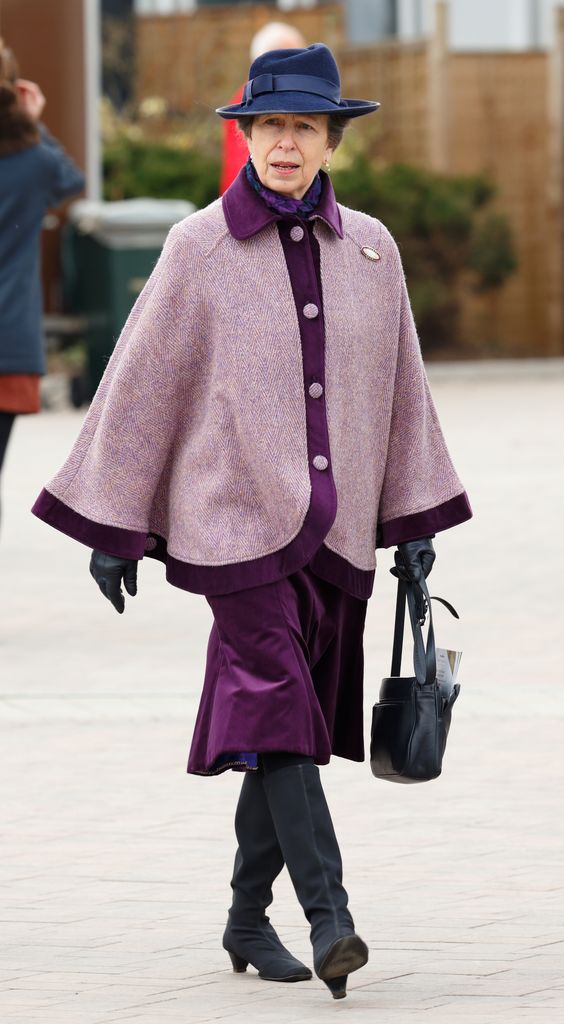 Princess Anne in a purple cape