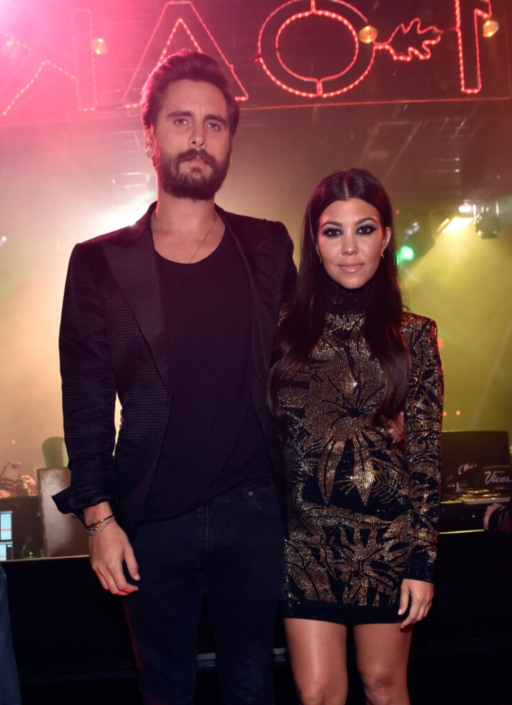 Scott and Kourtney with their arms around each other