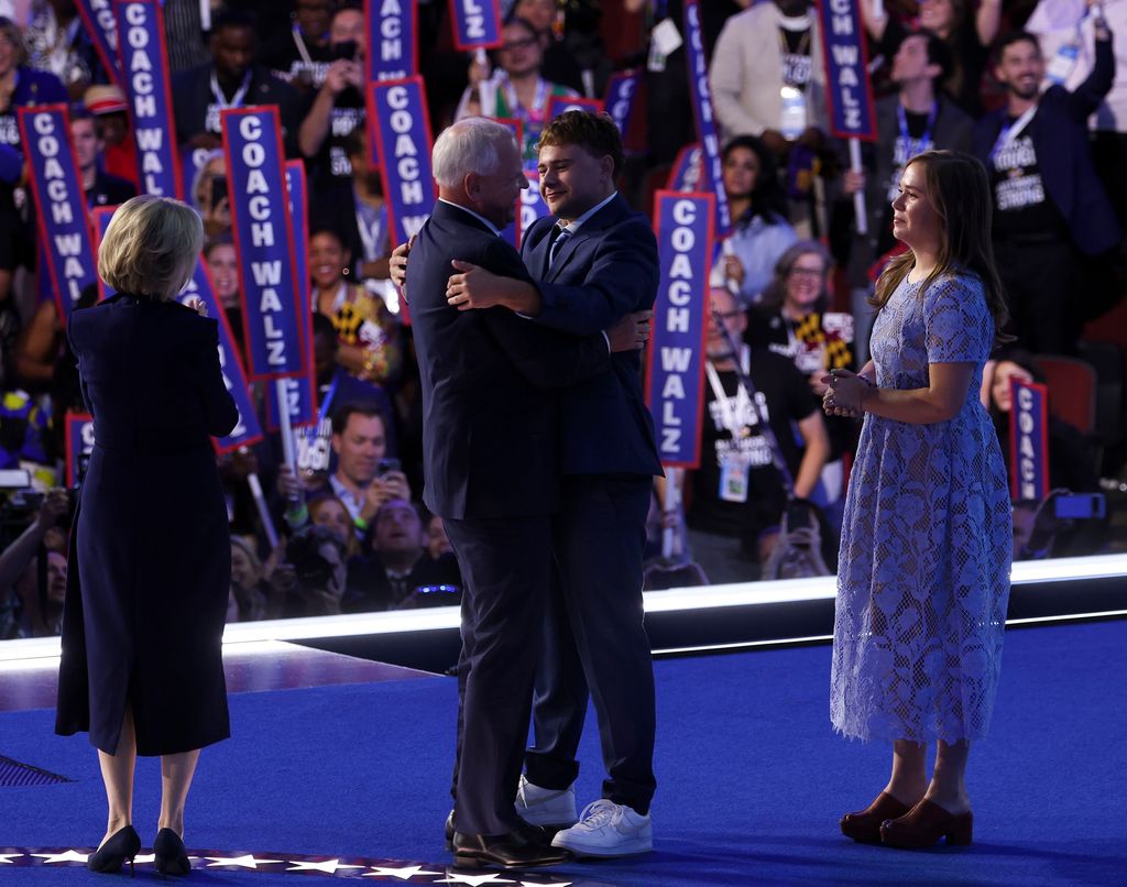 Democratic vice presidential nominee Minnesota Gov. Tim Walz is joined on stage by his wife, Gwen Walz, and children Gus and Hope after his speech at the Democratic National Convention at the United Center on Aug. 21, 2024, in Chicago