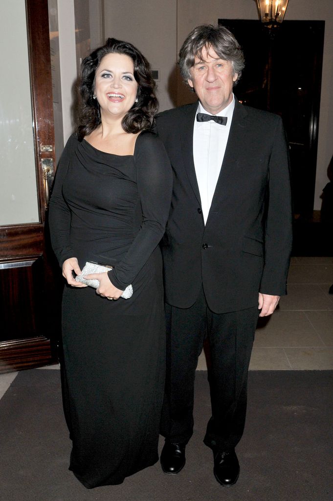 Ruth Jones standing with husband David Peet