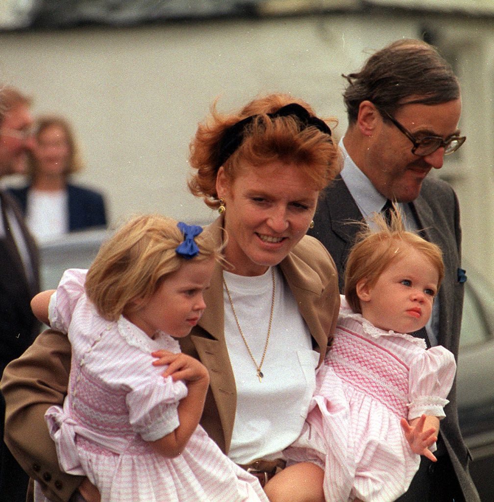 Beatrice and Eugenie matching in pink hand-smocked dresses