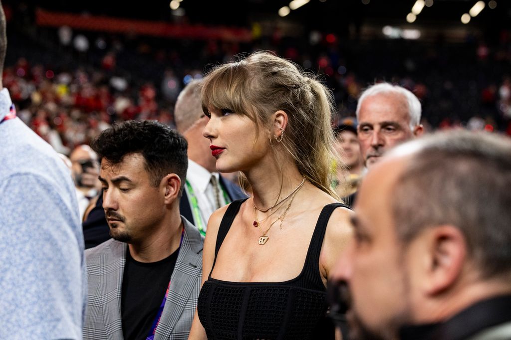 LAS VEGAS, NEVADA - FEBRUARY 11: Taylor Swift walks off of the field after the Kansas City Chiefs won Super Bowl LVIII against the San Francisco 49ers at Allegiant Stadium on Sunday, February 11, 2024 in Las Vegas, Nevada. (Photo by Lauren Leigh Bacho/Getty Images)