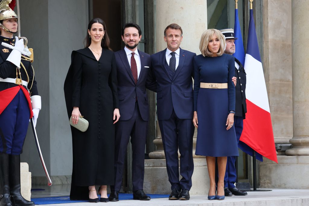 Rajwa al-Seif, Jordan's Crown Prince Hussein, French President Emmanuel Macron and French President's wife Brigitte Macron pose as they arrive before a meeting at the Elysee Palace in Paris on October 8, 2025