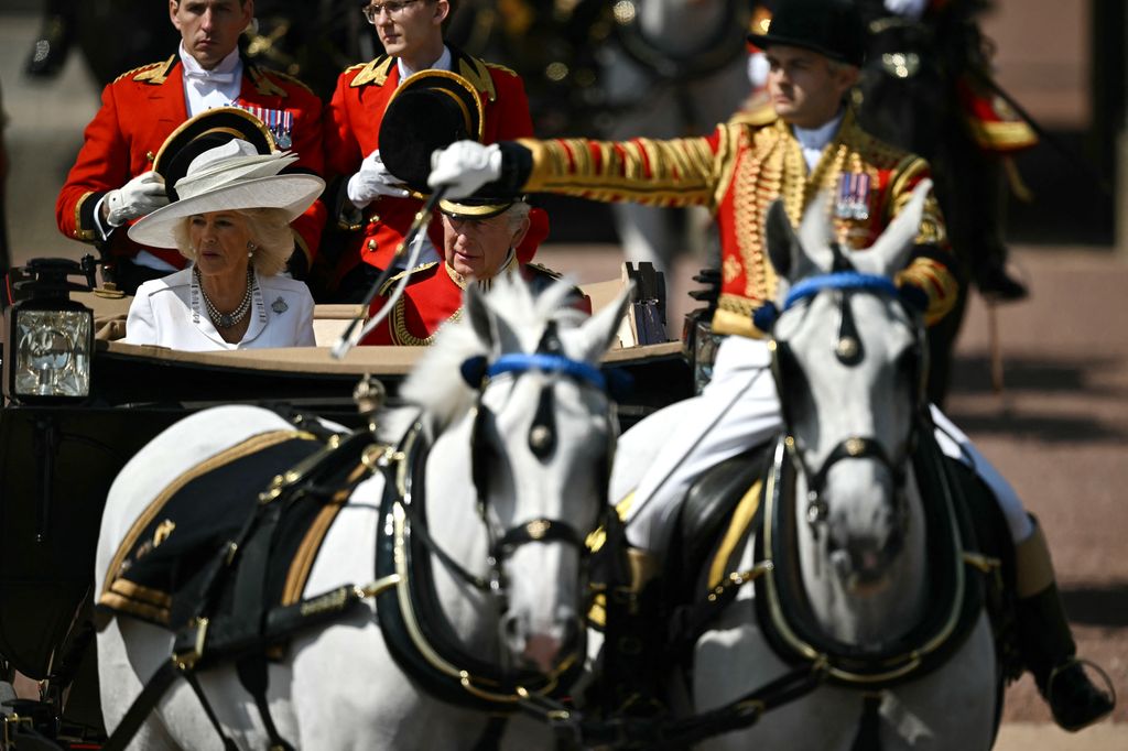 King Charles III and Queen Camilla make their way from Buckingham Palace to Horse Guards Parade 