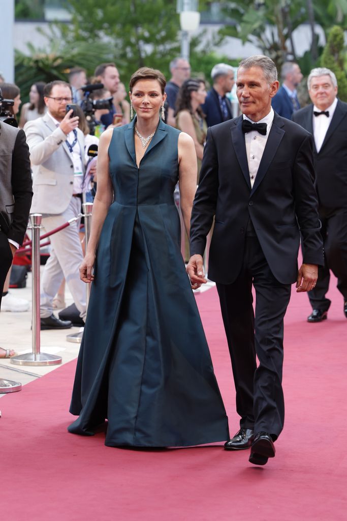 Princess Charlene wore a navy silk gown by Akris
