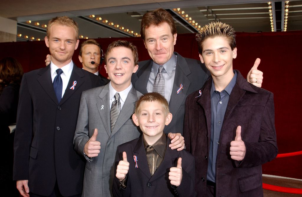 The cast of "Malcolm In The Middle" give a thumbs up sign at the 53rd Annual Primetime Emmy Awards at the Shubert Theater November 4, 2001 in Los Angeles, CA. Christopher Masterson, Frankie Muniz, Erik Per Sullivan, Bryan Cranston and Justin Berfield.