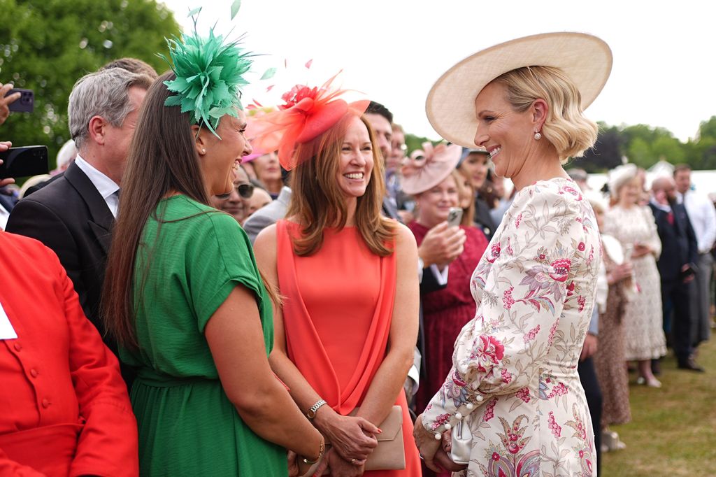 Zara Tindall chats and laughs with attendees at Buckingham Palace Garden Party