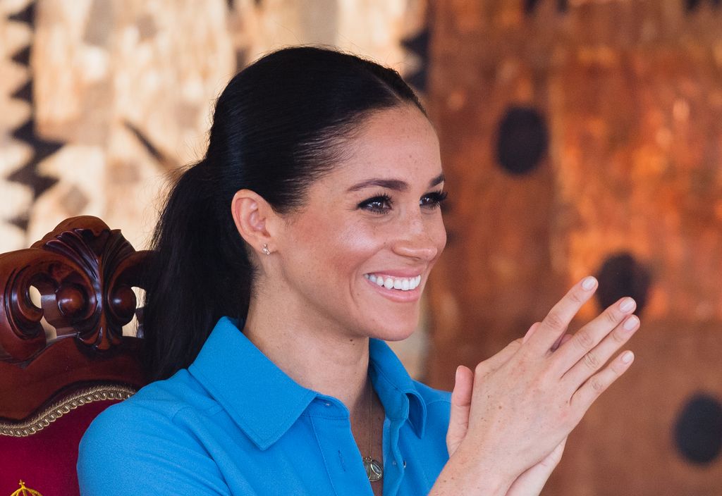 Meghan Markle wearing blue dress in Tonga