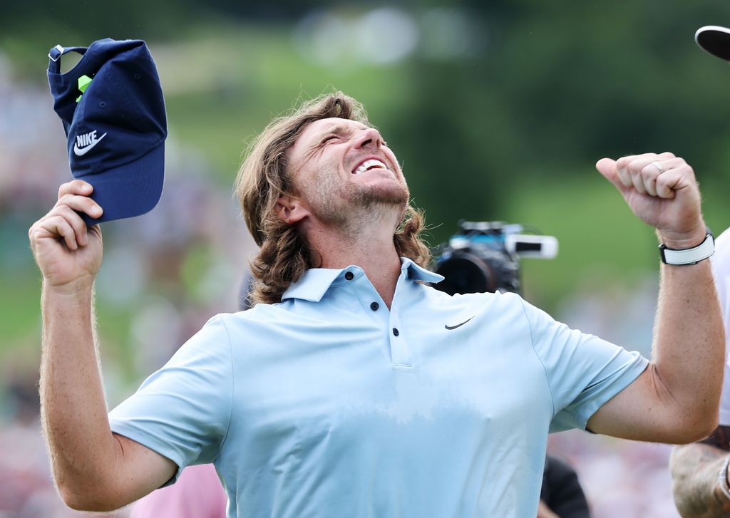 Tommy Fleetwood of England celebrates on the 18th green after winning the final round of the TOUR Championship 2025 at East Lake Golf Club on August 24, 2025 in Atlanta, Georgia.