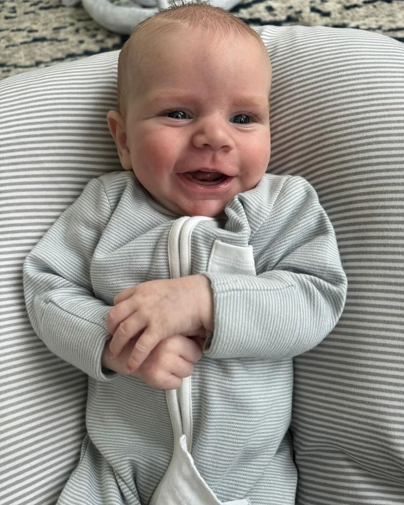 baby Jesse in striped babygrow