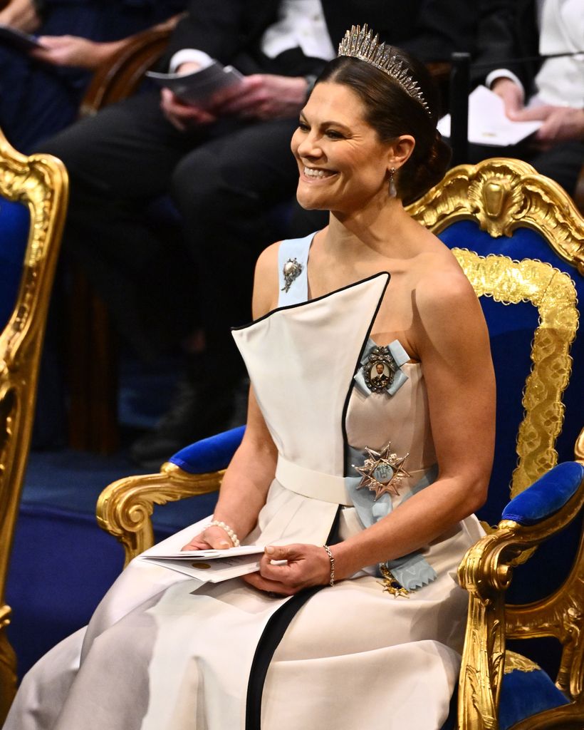 Crown Princess Victoria wearing gown and tiara at the Nobel Prize ceremony